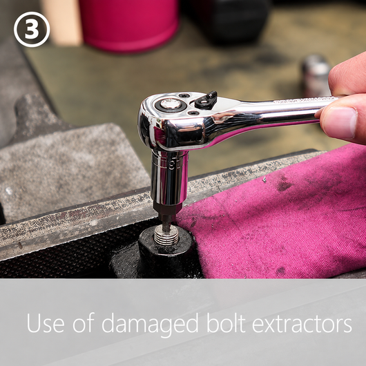 Step 3: a 1/2 inch socket on a ratchet turning the bolt extractor counter-clockwise into the pilot hole